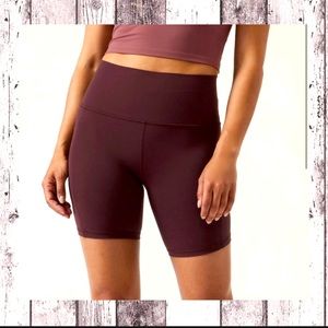 ATHLETA Salutation Stash Pocket II 7" BIKER Short-  Color: Spiced Cabernet